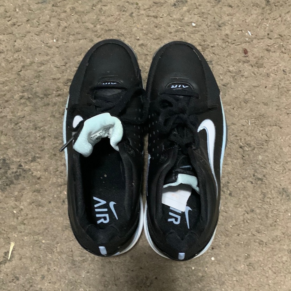 blue and black nike air shoe